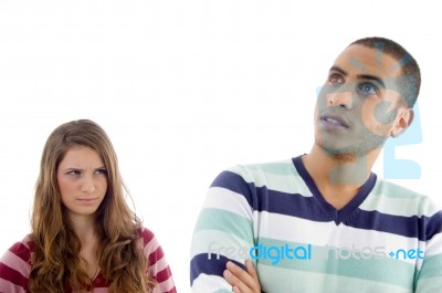 Angered Young Girl Looking To Guy Stock Photo