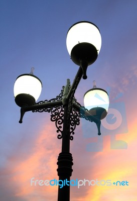 Antique Lamps On Twilight Sky Background Stock Photo