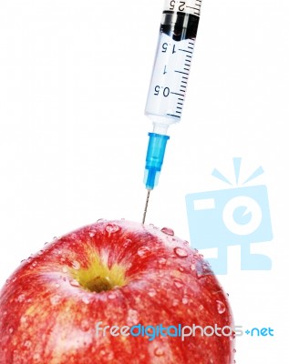 Apple And Syringe Stock Photo