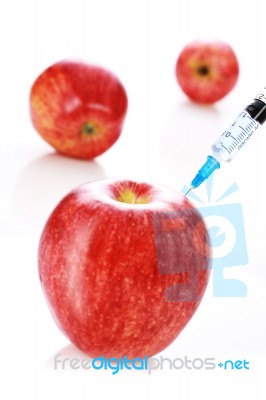 Apple And Syringe Stock Photo