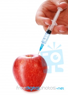 Apple And Syringe Stock Photo