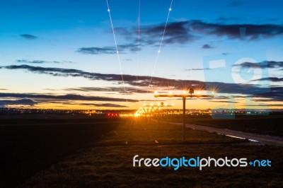 Approaching The Airport At Dusk Stock Photo