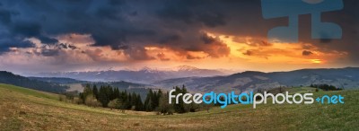 April Storm And Sunset In Mountains. Spring Evening Stock Photo