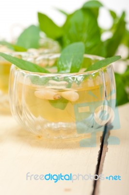 Arab Traditional Mint And Pine Nuts Tea Stock Photo