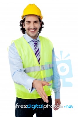 Architect Holds Out His Hand For A Handshake Stock Photo