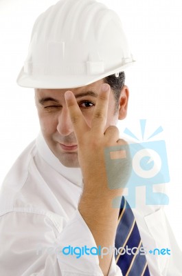 Architect With Victory Hand Gesture Stock Photo