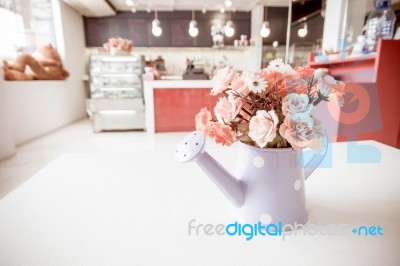 Artificial Flower In Vintage Style Coffee Shop Stock Photo