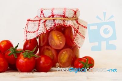 Artisanal Preparation Of Pickles Of Organic Cherry Tomatoes Stock Photo