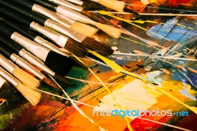 Artist Paint Brush On Painting Background  Stock Photo