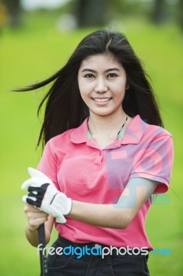 Asia Lady Relax With Golf Stock Photo