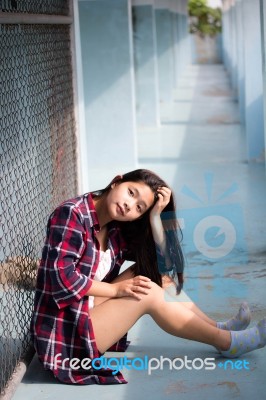 Asia Thai Teenager Women Scotch T-shirt Relax And Smile Stock Photo
