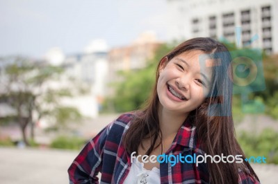 Asia Thai Teenager Women Scotch T-shirt Relax And Smile Stock Photo Asia Thai Teenager Women Scotch T-shirt Relax And Smile Stock Photo