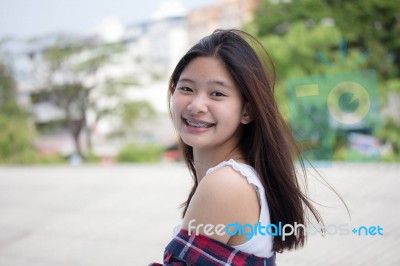Asia Thai Teenager Women Scotch T-shirt Relax And Smile Stock Photo Asia Thai Teenager Women Scotch T-shirt Relax And Smile Stock Photo