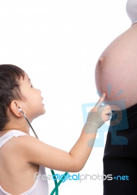 Asian Boy Touching His Mother Tummy Stock Photo