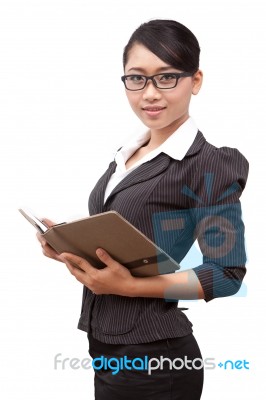 Asian Business Lady With Diary Stock Photo