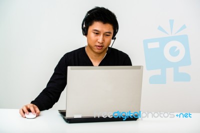 Asian Business Man With Headset Stock Photo