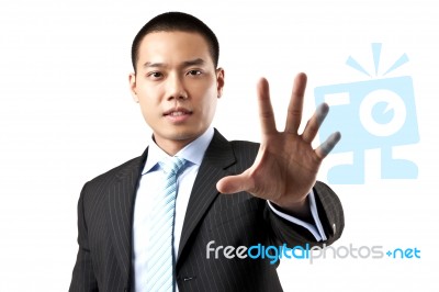 Asian Businessman Stop Gesture Stock Photo