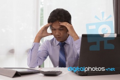 Asian Businessman With Pressure About This Work Stock Photo