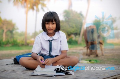 Asian Girl Of Student In Countryside Stock Photo