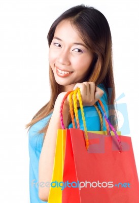 Asian Woman Holding Shopping Bag Stock Photo