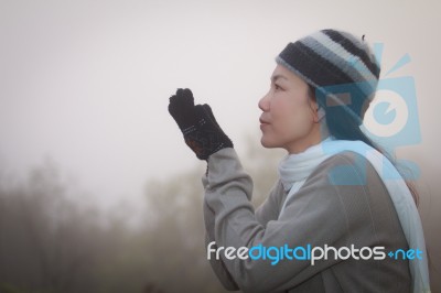 Asian Woman In Fog Stock Photo