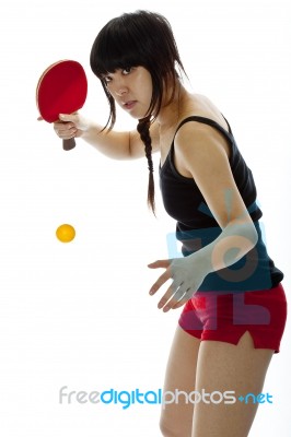 Asian woman playing forehand Stock Photo