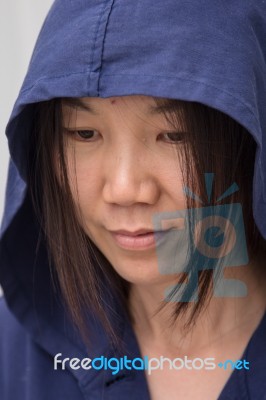 Asian Woman Wearing Hood Stock Photo
