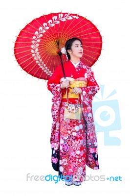 Asian Woman Wearing Japanese Traditional Kimono On White Background Stock Photo