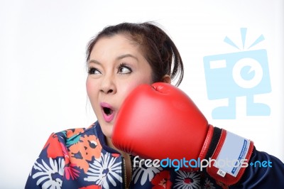 Asian Woman With Red Boxing Glove Punch Her Face Stock Photo