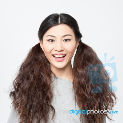 Astonished Young Smiling Girl Stock Photo