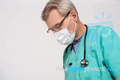 Attentive Look Of Male Surgeon Stock Photo
