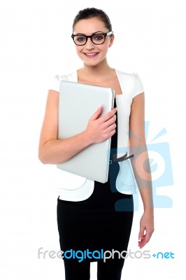 Attractive Businesswoman With A Folder Stock Photo