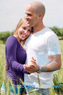 Attractive Couple Embracing Stock Photo