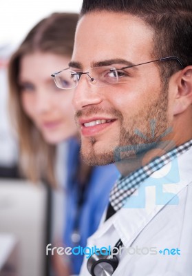 Attractive Doctor Smiling Stock Photo