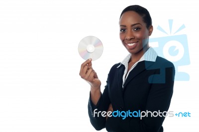Attractive Woman In Formals Holding Cd Stock Photo