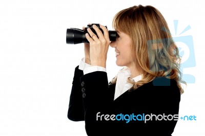 Attractive Woman Viewing Through Binocular Stock Photo