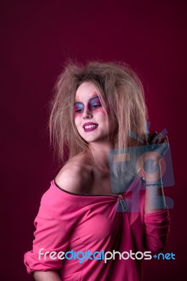 Attractive Young Girl With Disheveled Hair Stock Photo