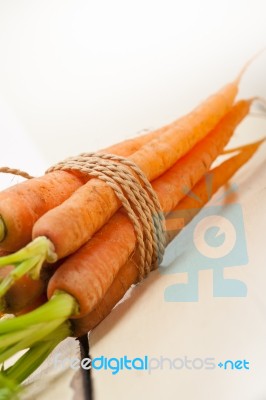 Baby Carrots Bunch Tied With Rope Stock Photo