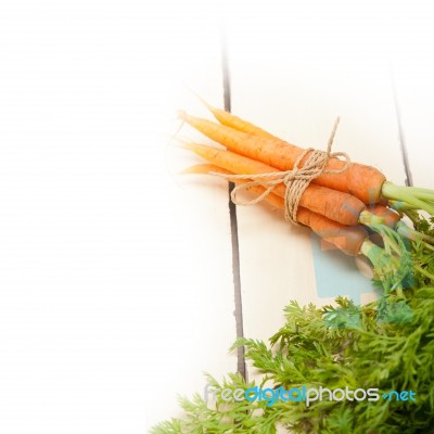 Baby Carrots Bunch Tied With Rope Stock Photo