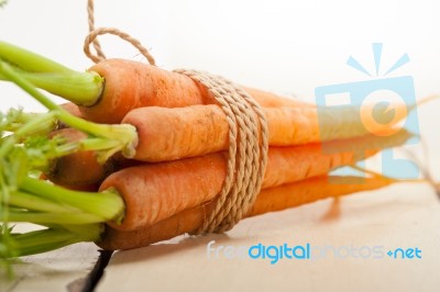 Baby Carrots Bunch Tied With Rope Stock Photo