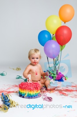 Baby Girl Celebrating Her First Bithday With Gourmet Cake And Ba… Stock Photo