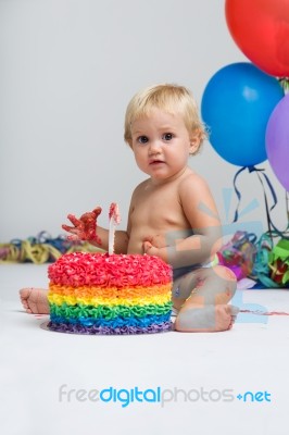 Baby Girl Celebrating Her First Bithday With Gourmet Cake And Ba… Stock Photo