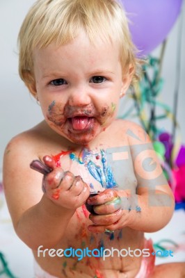 Baby Girl Celebrating Her First Bithday With Gourmet Cake And Ba… Stock Photo