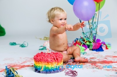 Baby Girl Celebrating Her First Bithday With Gourmet Cake And Ba… Stock Photo