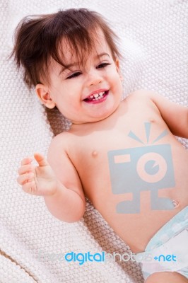 Baby Laughing After The Bath In A White Towel Stock Photo