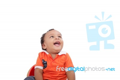 Baby Laughing Over White Background. Active One Year Child Stock Photo