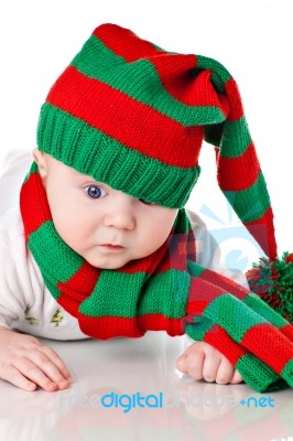 Baby With Christmas Hat And Scarf Stock Photo