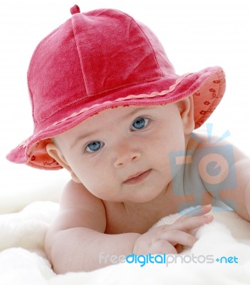 Baby With Red Hat Stock Photo