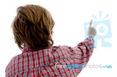 Back Pose Of Boy Pointing Stock Photo