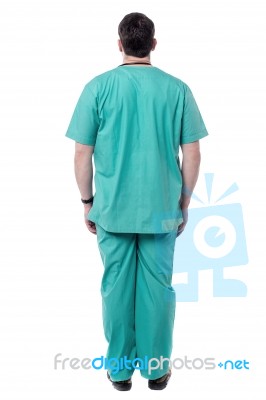 Back Pose Of Male Doctor Stock Photo